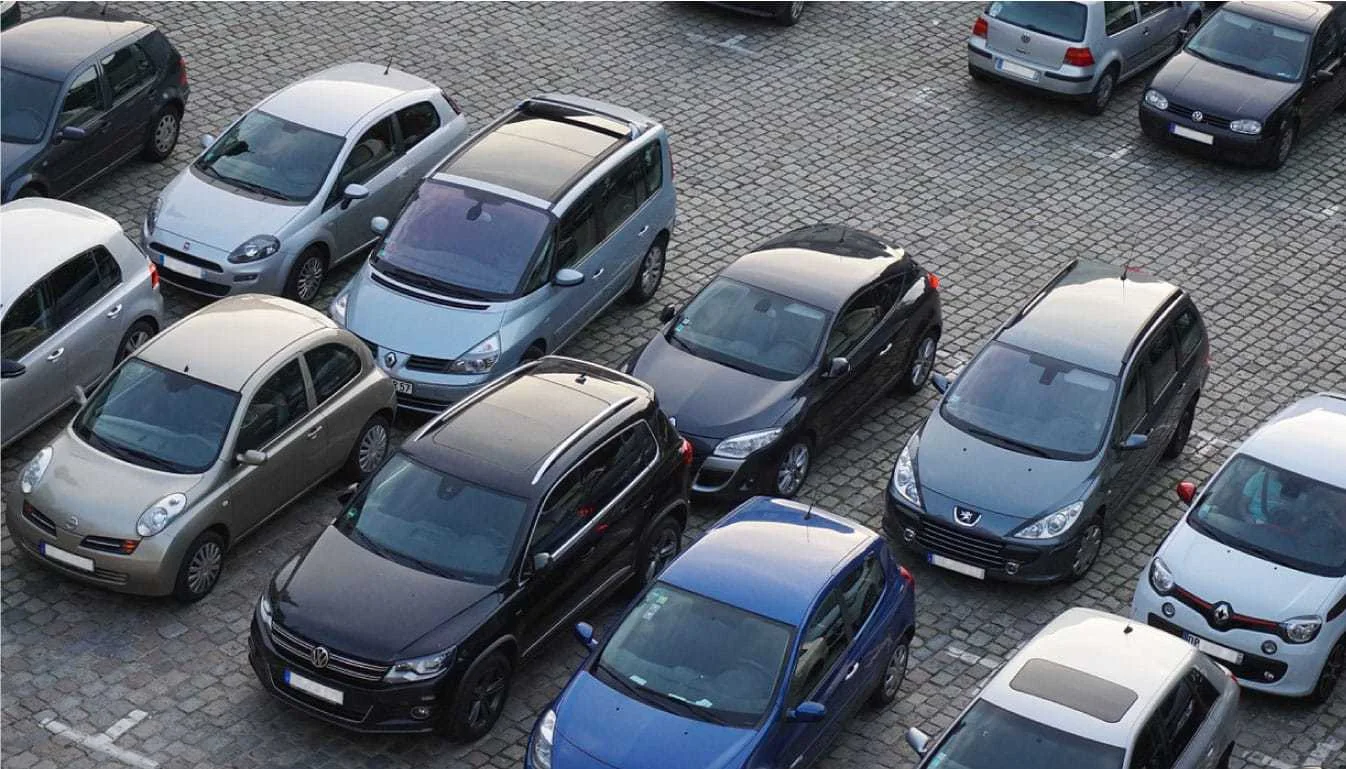 Vehicles arranged in a professionally managed parking lot
