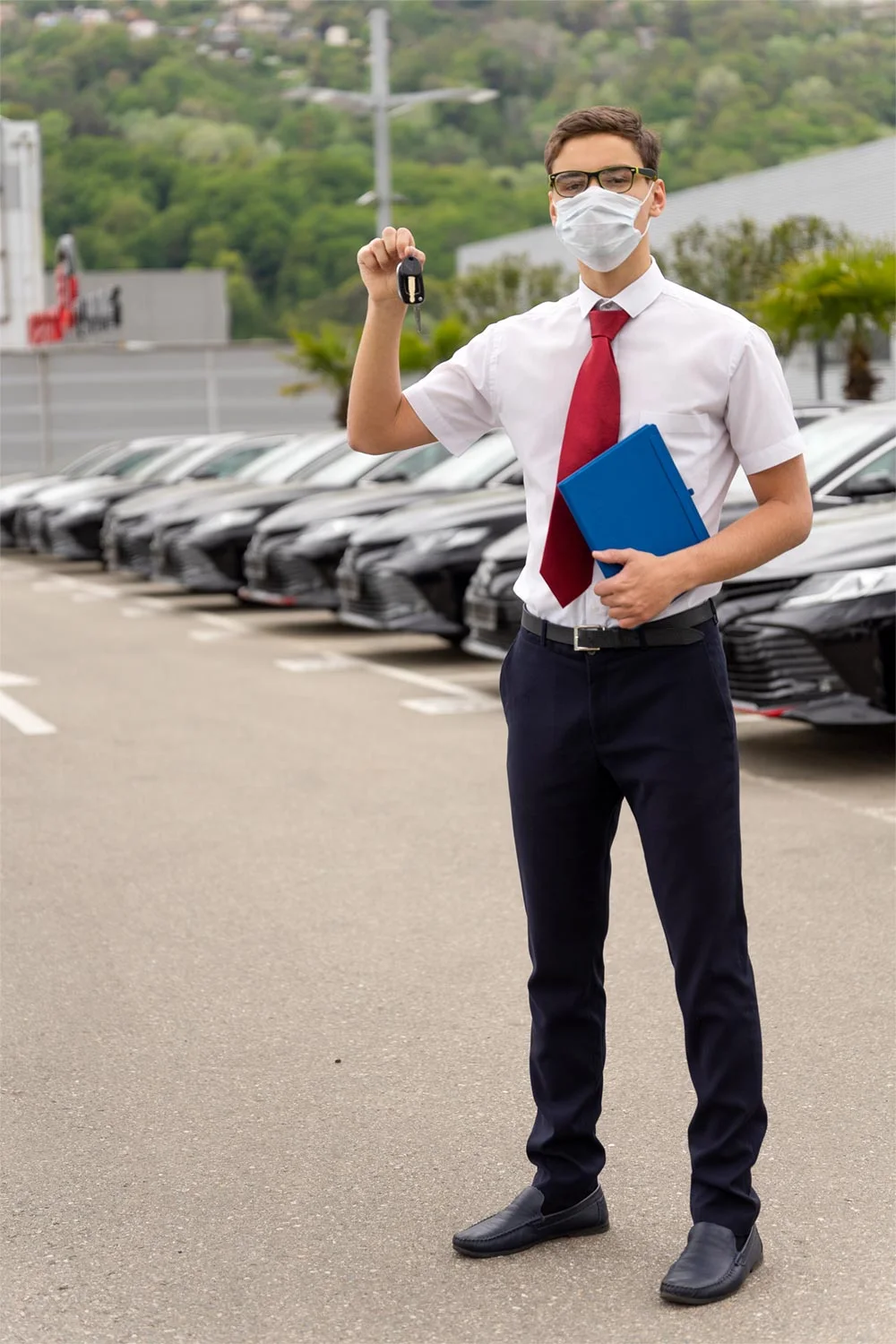 Valet parking attendant ready to assist arriving drivers
